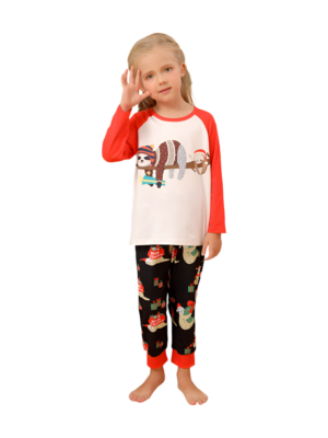 Christmas sloths hanging from the garlands, ready to welcome Father Christmas matching family pyjamas girl front