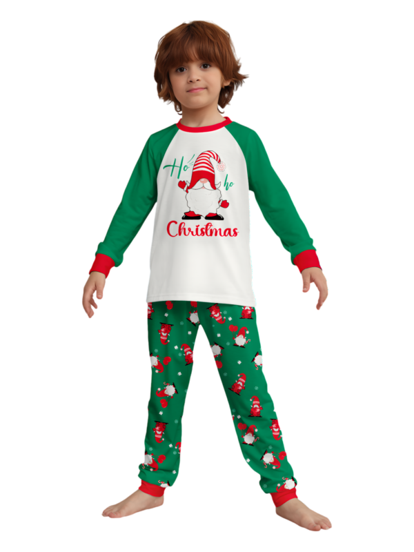 The bearded Santa buried under his gigantic hat, matching family pyjamas