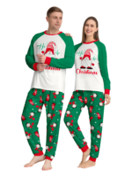 The bearded Santa buried under his gigantic hat, matching family pyjamas