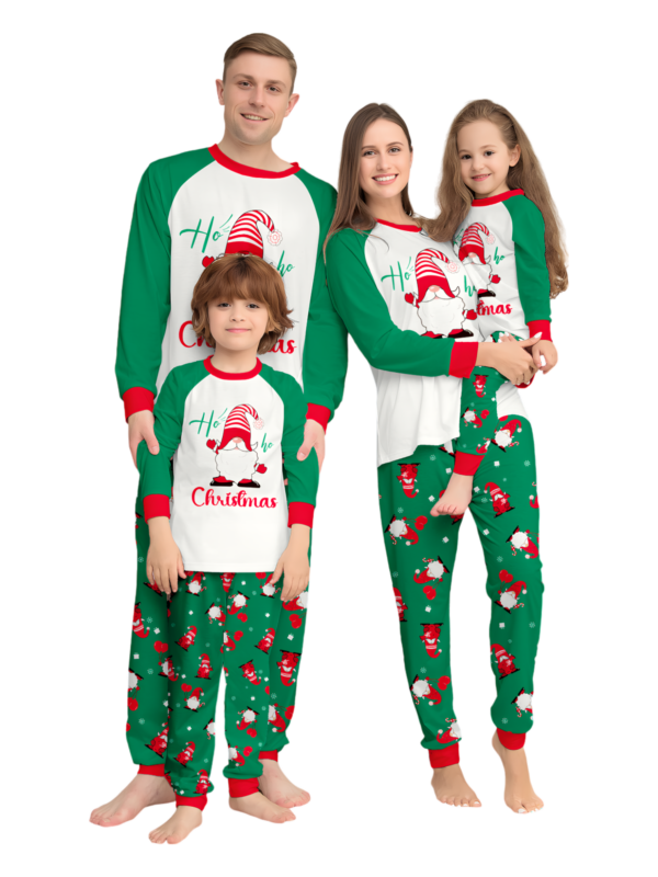 The bearded Santa buried under his gigantic hat, matching family pyjamas