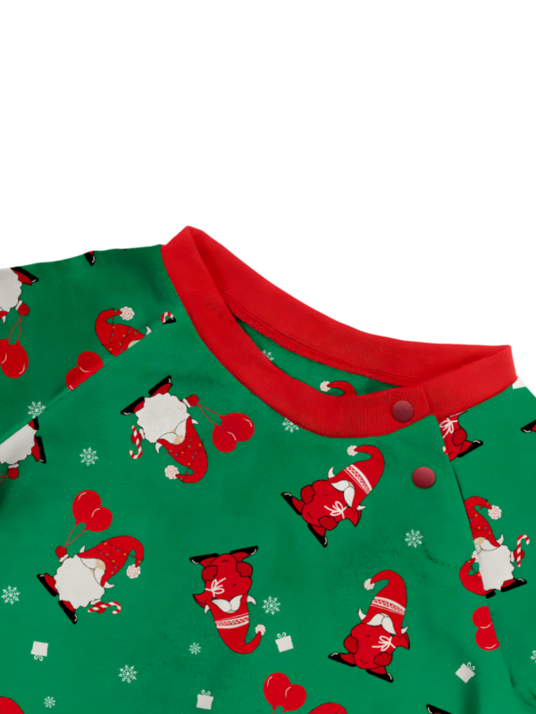 The bearded Santa buried under his gigantic hat, matching family pyjamas