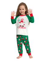 The bearded Santa buried under his gigantic hat, matching family pyjamas