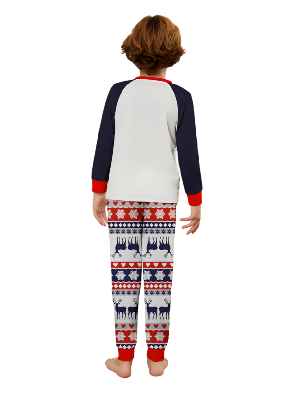 Cheeky little reindeer dressed for Christmas, matching christmas pyjamas