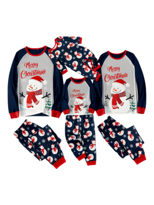 Family Christmas pyjamas of a happy snowman covered for winter with snowman motifs on the trousers details