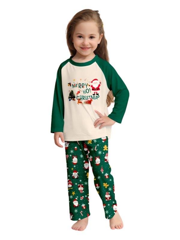 Original starry green Christmas pyjamas with Christmas and Santa motifs