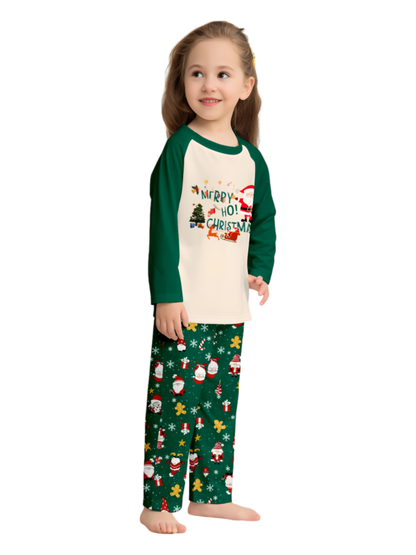 Original starry green Christmas pyjamas with Christmas and Santa motifs