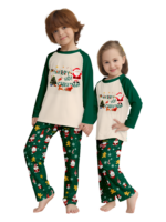 Original starry green Christmas pyjamas with Christmas and Santa motifs