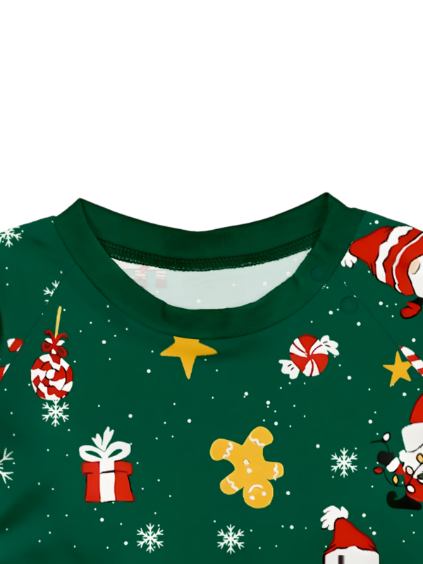 Original starry green Christmas pyjamas with Christmas and Santa motifs