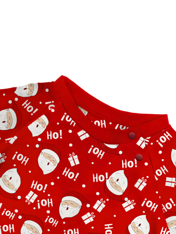 Santa carrying a full Christmas bag, red pyjamas for all the family