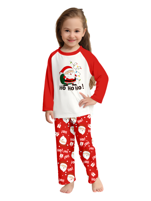 Santa carrying a full Christmas bag, red pyjamas for all the family