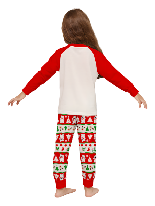 Smiling reindeer and his polar bear friend, dressed for winter matching family pyjama